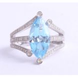 A large 9ct diamond and topaz set dress ring, size O, 5.4g.