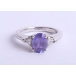 A platinum and tanzanite set ring, the shank stamped 1.33 (carats), marked 'Rhapsody', platinum 950,