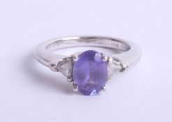 A platinum and tanzanite set ring, the shank stamped 1.33 (carats), marked 'Rhapsody', platinum 950,