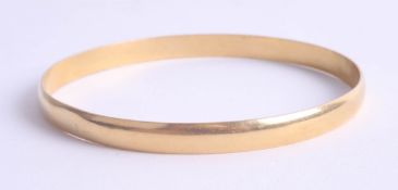 An Egyptian high carat 'slave' bangle marked on the outside, purchased circa 1940/50's in Egypt,