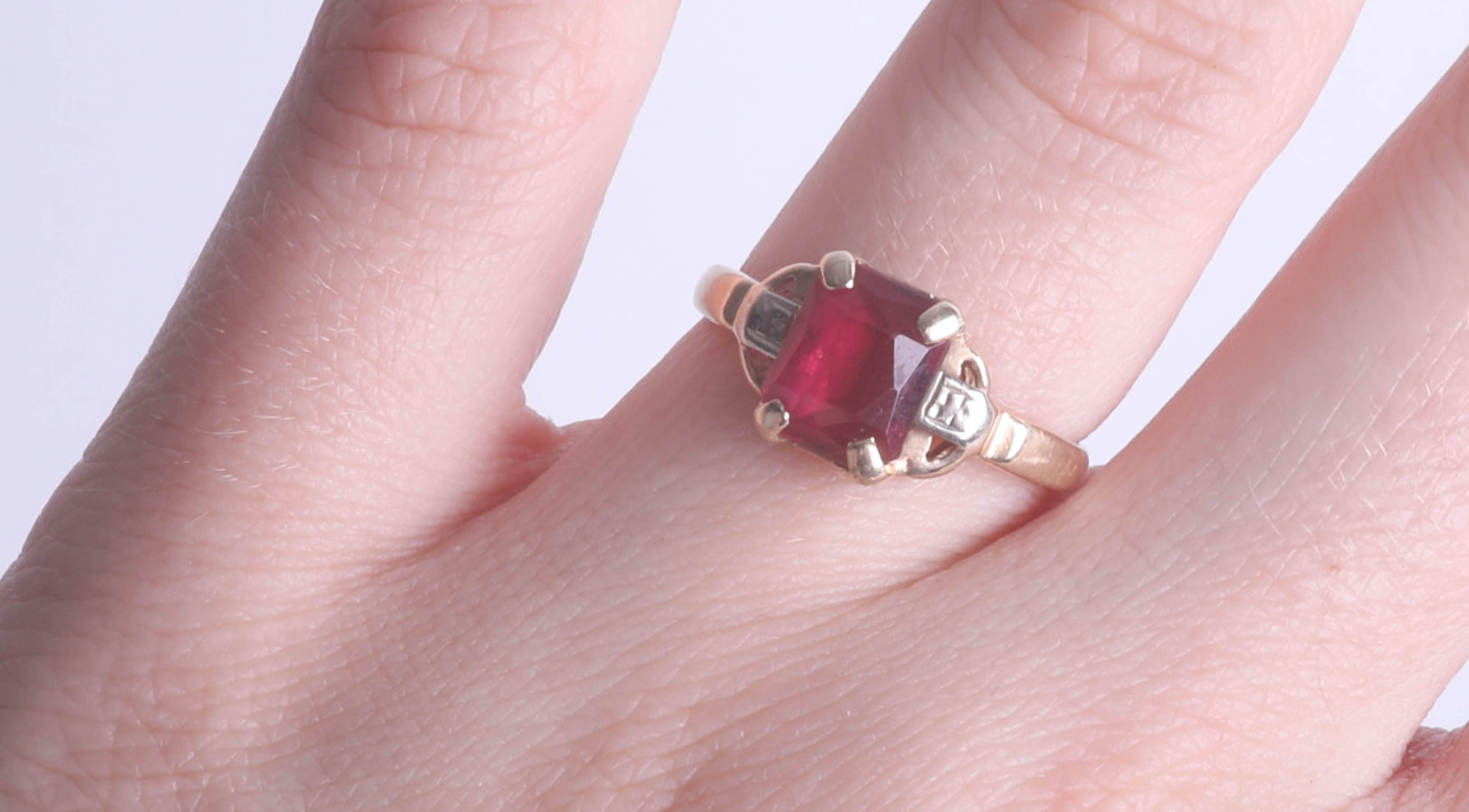 A ruby style and diamond set ring in yellow gold, unmarked, size L. - Image 2 of 2