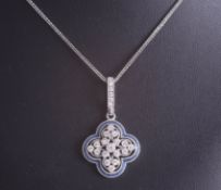 An 18ct white gold and diamond pendant set with seventeen round cut diamonds within a blue border