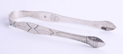 A pair of George III silver bright cut sugar tongs, London 1791, maker PB over AB (Peter