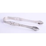 A pair of George III silver bright cut sugar tongs, London 1791, maker PB over AB (Peter