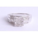 A 9ct diamond set square dress ring, size S.
