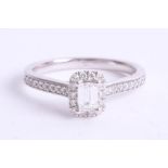 An 18ct diamond set cluster ring, size O.