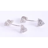 A pair of contemporary 18ct white gold and diamond set earrings approx. 1.03ct, the drop pendants