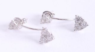 A pair of contemporary 18ct white gold and diamond set earrings approx. 1.03ct, the drop pendants