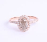 An 18ct white gold Champagne diamond halo ring, approx 1.15ct, ring size O.