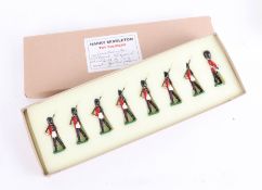 A boxed set of Harry Middleton toy soldiers, Marching Guards, Britains style.