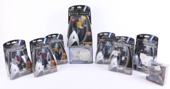 A collection of Star Trek models, to include character models of Scotty, Spock and Kirk, model of