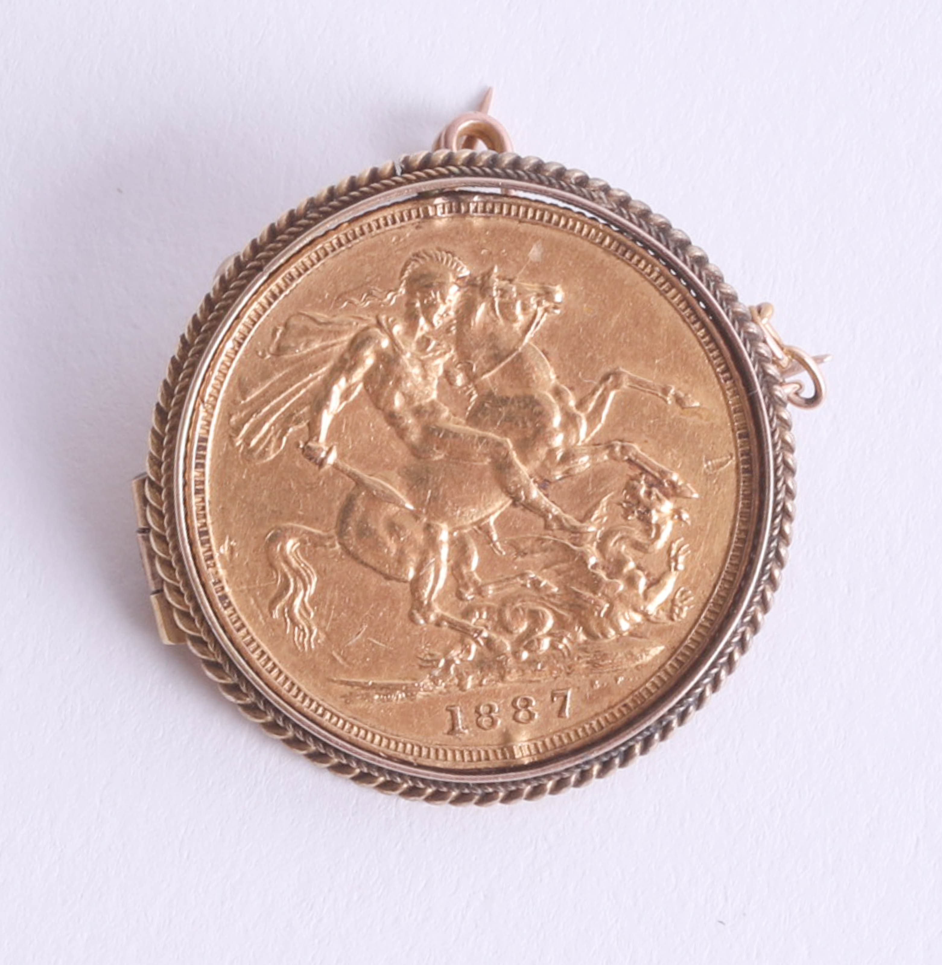 Victoria 1887 gold sovereign in brooch mount.