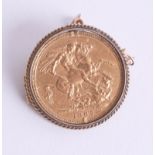 Victoria 1887 gold sovereign in brooch mount.