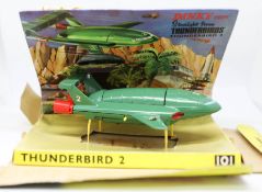 Dinky Toys, Thunderbirds Two and Four, 101 boxed.