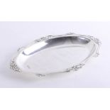 A modern silver oval dish with pierced border of stylised flowers, Sheffield, maker WH and S