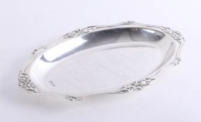 A modern silver oval dish with pierced border of stylised flowers, Sheffield, maker WH and S