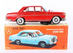 A Japanese Ichiko Mercedes Benz battery powered mystery action scale model, boxed.
