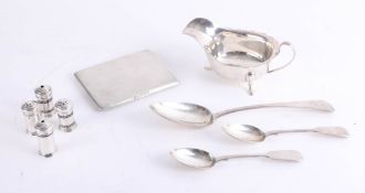 A silver sauceboat, silver salt and peppers, a George III silver spoon, two teaspoons and silver