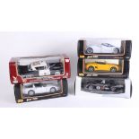 A mixed collection of five large scale models, including Maisto Special Edition Mustang Mach III,