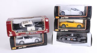 A mixed collection of five large scale models, including Maisto Special Edition Mustang Mach III,