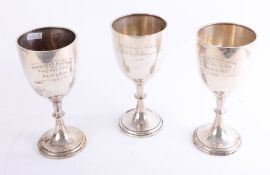 Three silver trophies, each marked 'Minehead Auction Christmas Fat Stock, 1929, 1930', height