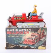A Magic Action Bulldozer battery operated Japanese toy, boxed.