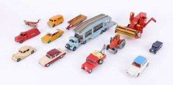 A collection of eleven models, including Dinky Toys Car transporter, Petrol Tanker, Humber, also
