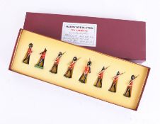 A boxed set of Harry Middleton toy soldiers 'Guards Marching, Fixed Bayonets'.