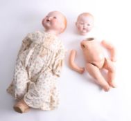 Two Armand Marseille bisque head dolls (2).