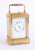 A French carriage clock with striking on a gong, platform escapement, the dial with Roman and Arabic