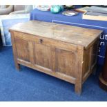 An antique English oak panelled coffer, length 115cm.