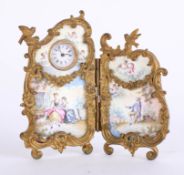 A 19th/early 20th century easel porcelain and gilt metal miniature clock, possibly French, the