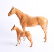 Beswick, Pinto and foal, tallest 22cm.