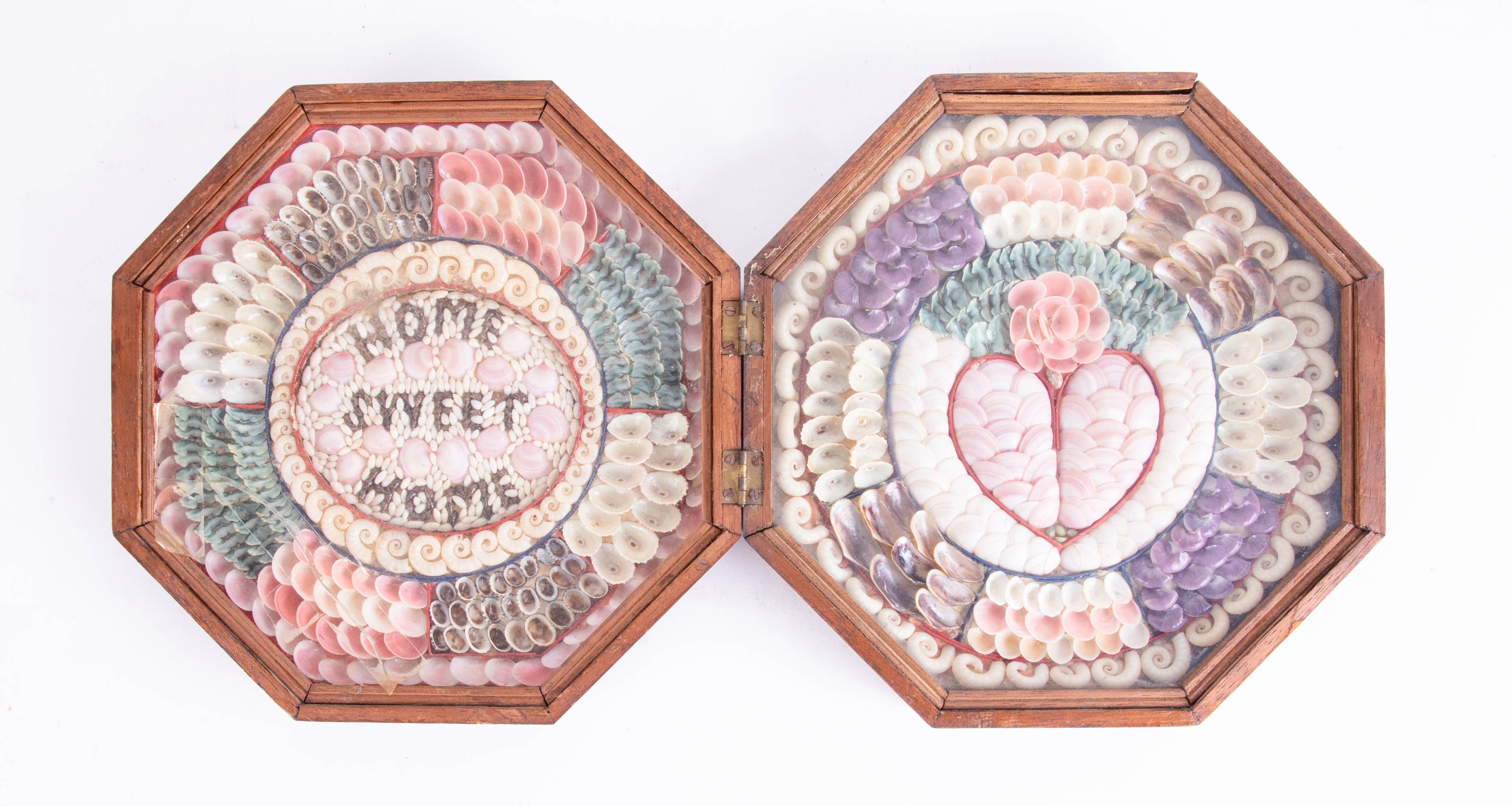 A 19th century Sailors Shell Valentine in folding octagonal box, 'Home Sweet Home', diameter 23cm.