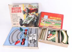 A German tinplate motorway set together with a Airfix motor racing set (2).