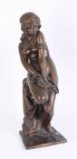 A bronze Art Deco style figure of a lady in chains, height 44cm.