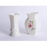 Belleek, two modern Parian china vases, boxed.