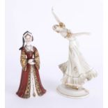 A continental porcelain figure of a lady in gilt ball gown with black headscarf, Vienna mark, height