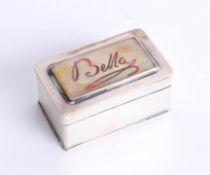 A small silver and enamelled box with match strike, the top with plaque marked 'Bella', makers
