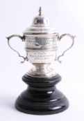 Of Plymouth and Lady Nancy Astor interest, a small silver doubled handled trophy on a pedestal base,