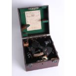 A marine sextant by Henry Hughes and Son, number 45619 with label, certificate 1945 Husun, cased,