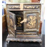 A late 19th/early 20th century Chinese lacquered cabinet on stand, the interior fitted with an