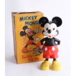 Mickey Mouse a celluloid toy Mickey Mouse Twirly Tail Toy, wind-up mechanism, with original box.