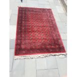 A patterned floor rug label marked 'Tribal', 1.60m x 2.30m.