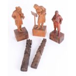 Three continental wood carvings together with a pair of carvings King and Queen (5) height 30cm.