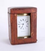 Carriage clock with travel case, the dial marked Mappin and Webb Ltd. with key, 15cm, handle up.