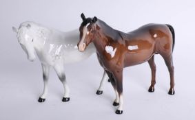 Two Beswick horses.