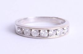 An 18ct white gold half eternity ring set with diamonds, approx. 0.55ct, estimated colour and