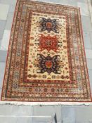 A patterned floor rug possibly Persian?, 2.00m x 2.90m.