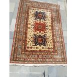 A patterned floor rug possibly Persian?, 2.00m x 2.90m.